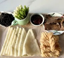 Crispy flatbread roll with fried dough sticks