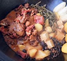 Stewed Pork Ribs and Chicken in Iron Pot