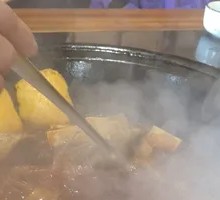 Stewed Pork Ribs and Fish in Iron Pot
