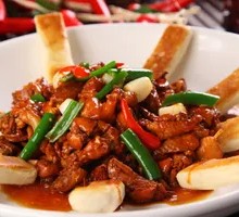 Stir-Fried Rooster in Iron Pot