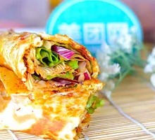 Egg-filled pancake with chicken strips