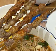 Skewered Lamb on Steel Rod