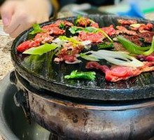 Grilled Meat on Iron Skillet