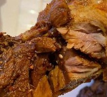 Charcoal-grilled lamb leg