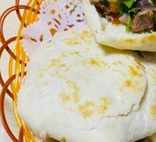 Pork head meat in fire-baked bun