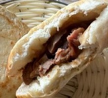 Pork head meat in fire-baked bun