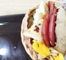 Stuffed flatbread with sausage