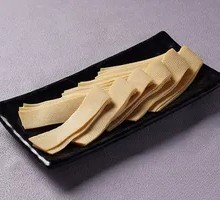 Oil-soaked tofu skin