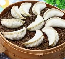 Pork and scallion steamed dumplings