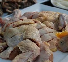 Stewed Rooster in Iron Pot