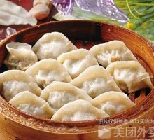 Handmade Pork and Scallion Steamed Dumplings