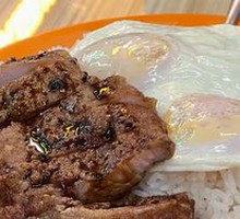 Signature Pork Chop with Two Eggs Fried Rice