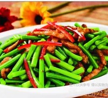 Stir-fried garlic shoots with pork