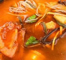 Spicy Pork Dumpling Noodles