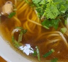 Hand-extruded noodle soup