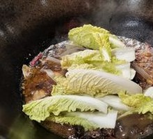 Stir-Fried Rooster in Iron Pot