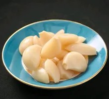 Sweet Pickled Garlic in Small Dish