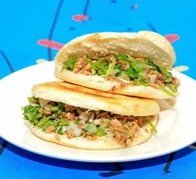 Green Pepper and Cumin Stir-Fried Meat in a Steamed Bun