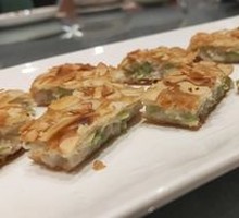 Pan-Fried Dumplings with Greens