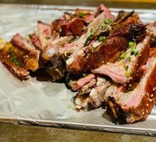 Signature Charcoal-Grilled Lamb Ribs