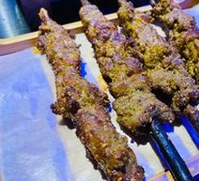 Lamb Skewers on Red Willow Wood