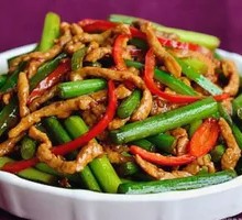 Stir-fried shredded pork with garlic shoots
