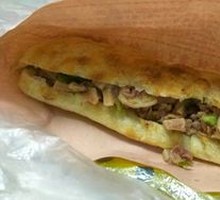 Minced Meat Stuffed Intestine Fire Cake