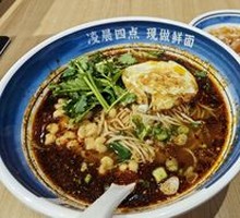 Signature Spicy Broad Noodles with Pea and Pork