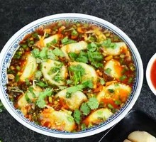 Beef and Scallion Sour Soup Dumplings