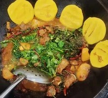 Stewed Pork Ribs and Chicken in Iron Pot