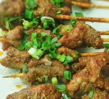 Signature Charcoal-Grilled Lamb Skewers
