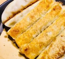 Sour Cabbage and Pork Pan-Fried Dumplings