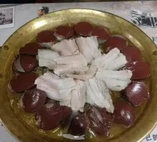 Boiled pork and blood sausage