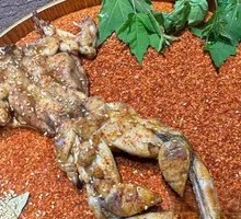 Sizzling Frog Legs