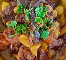 Braised Chicken in Large Pot with Firewood