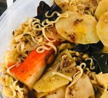 Spicy Noodles with Crab Sticks and Fish Dumplings