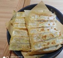 Sour Cabbage and Pork Pan-Fried Dumplings