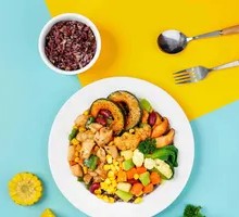 Braised Chicken with Seasonal Vegetables and Grains Bowl
