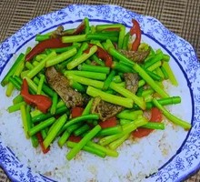 Stir-fried Garlic Shoots with Pork over Rice