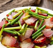 Braised Garlic Shoots with Preserved Meat