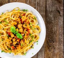 Spicy Chicken Cubes over Noodles