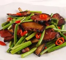 Braised Garlic Shoots with Preserved Meat