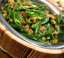 Green Pepper and Pork Stir-fry in Wooden Bucket Rice