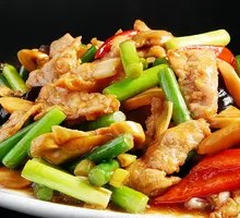 Stir-fried garlic shoots with pork