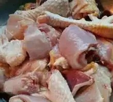 Stewed Rooster in Iron Pot