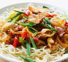 Onion Stir-Fry with Pork over Noodles