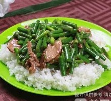 Stir-Fried Garlic Shoots with Pork over Rice