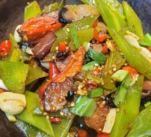 Spicy Sichuan-style腊肉 with Bitter Melon