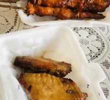 Grilled Chicken Wing with Meat Skewers