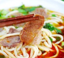 Hand-extruded noodle soup